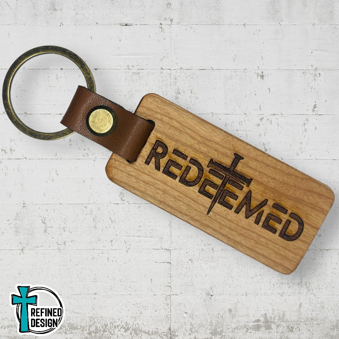 “Redeemed Nail Cross” Wood and Leather Keychain