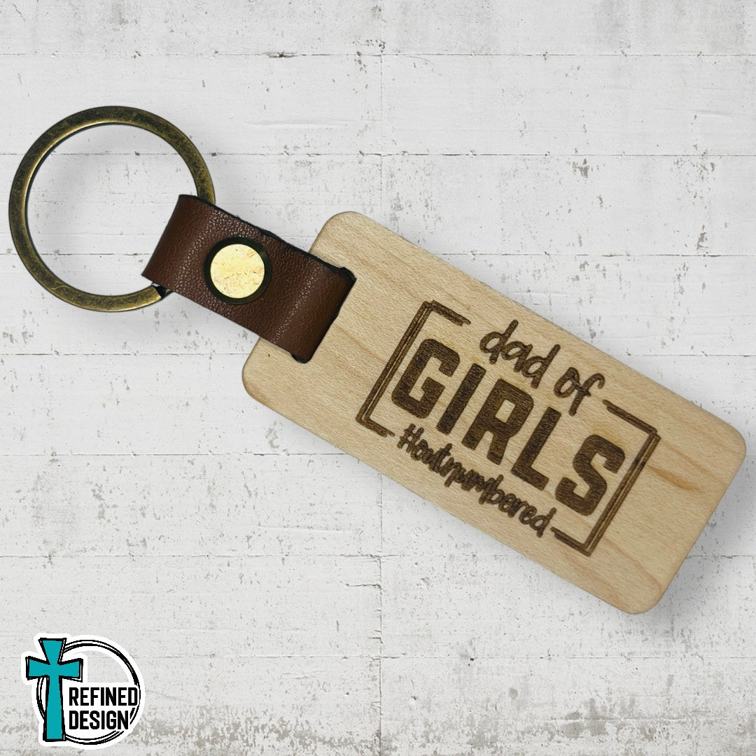 “Dad of Girls #OutNumbered” Wood and Leather Keychain