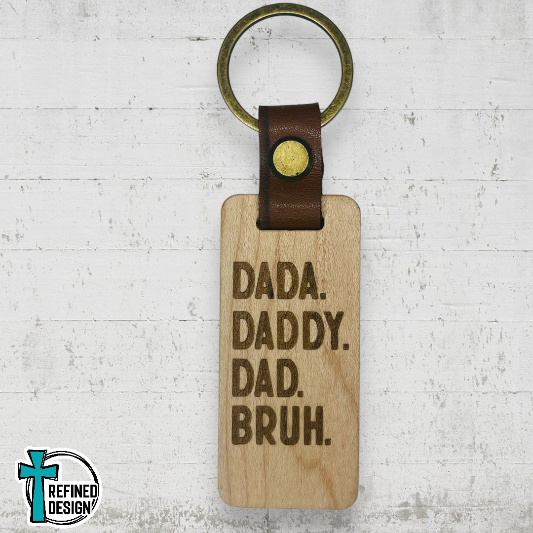 “Dada. Daddy. Dad. Bruh.” Wood and Leather Keychain